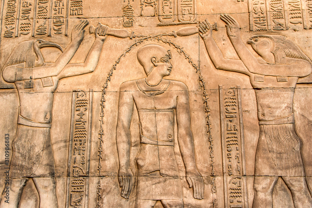 Ruins and Hieroglyphs in the famous Temple of Kom Ombo in Egypt on nile river bank