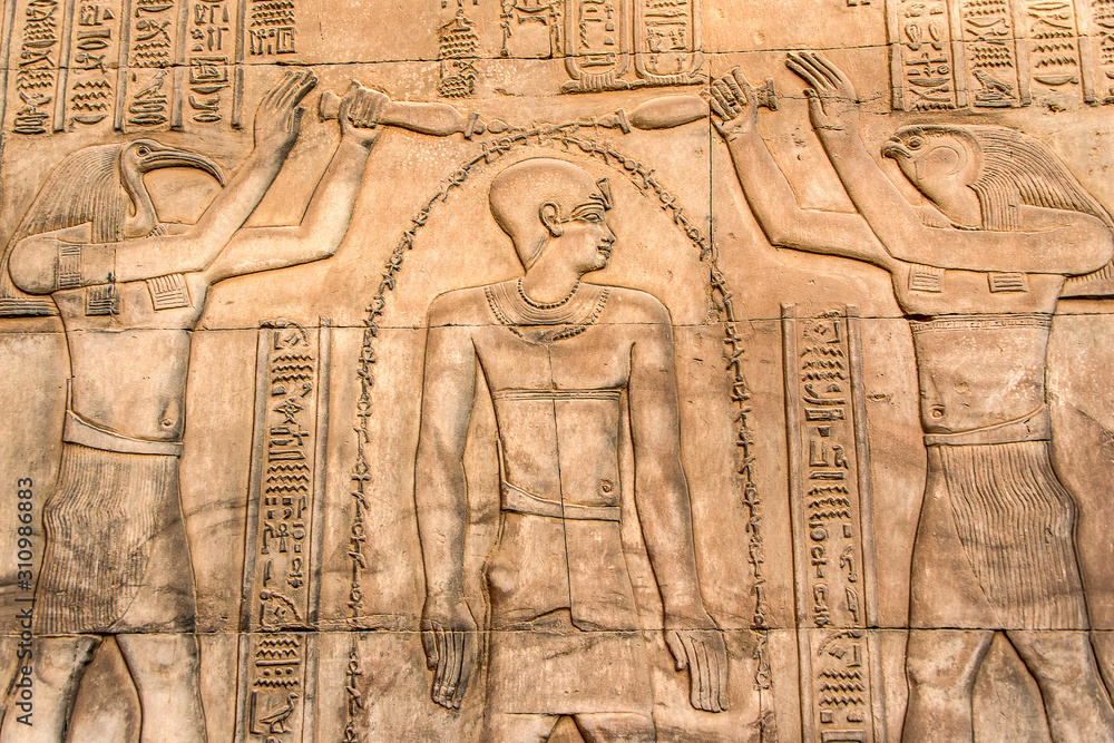 Naklejka premium Ruins and Hieroglyphs in the famous Temple of Kom Ombo in Egypt on nile river bank