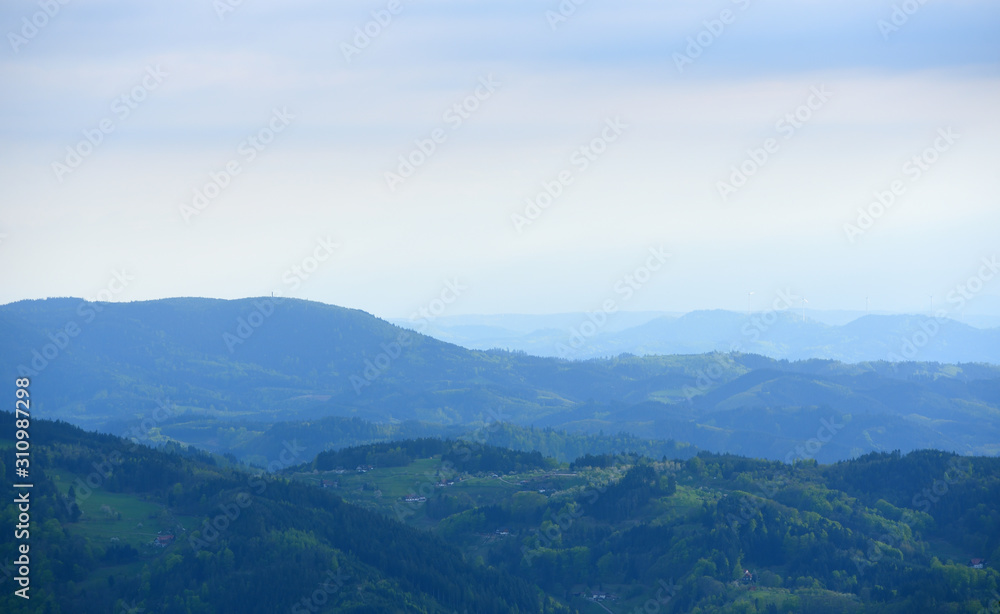 Picturesque landscape with hills and blue air, the atmosphere in the European forest of Schwarzwald,, Germany. Clean Air Ecology Concept