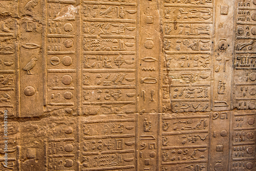 Ruins and Hieroglyphs in the famous Temple of Kom Ombo in Egypt on nile river bank