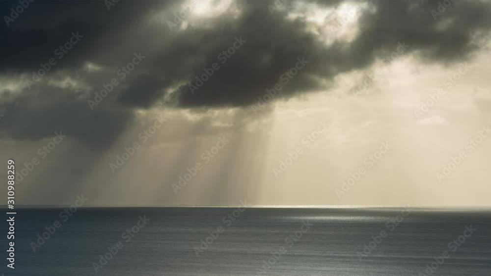 Time lapse of sunbeams and clouds over Norwegian sea Time lapse of sunbeams and clouds over Norwegian sea