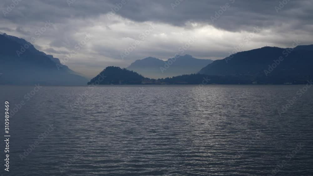 Bellagio, Lake Como in Italy. Cloudy day view from Menaggio Bellagio, Lake Como in Italy. Cloudy day view from Menaggio