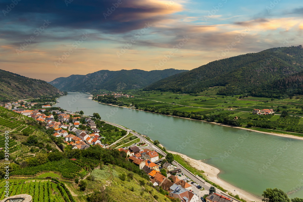 Wachau valley with the river Danube and town Spitz on a sunset. Lower Austria.