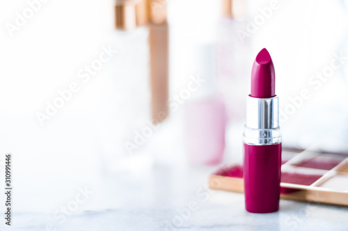 Konstfotografi Cosmetics, makeup products on dressing vanity table, lipstick, foundation base,