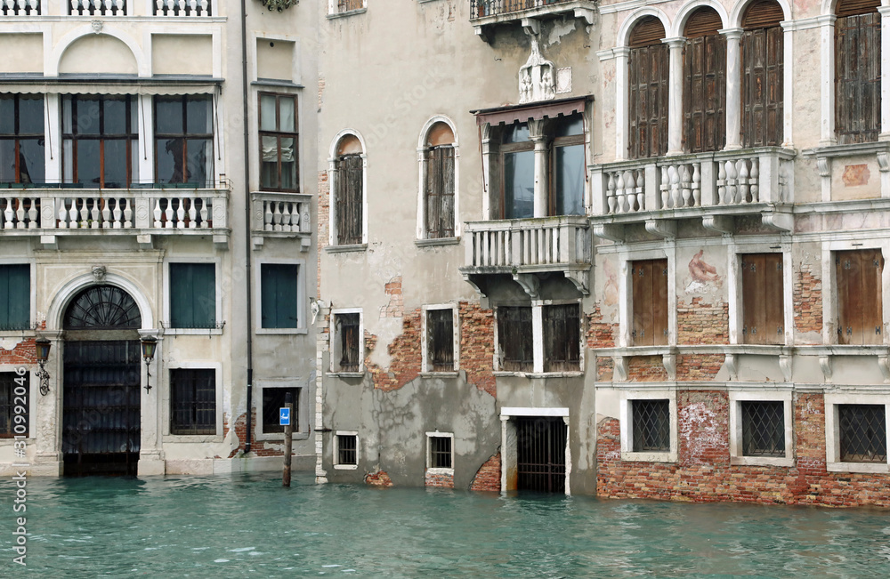 palaces in Venice on the Grand Canal during the high tide and th palaces in Venice on the Grand Canal during the high tide and th