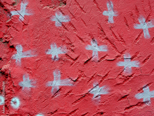 The old painted wall is stained with paint. Background and texture
