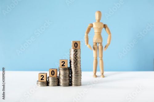 Increasing of coins by Investment Management. Business concept for the Year2020. photo