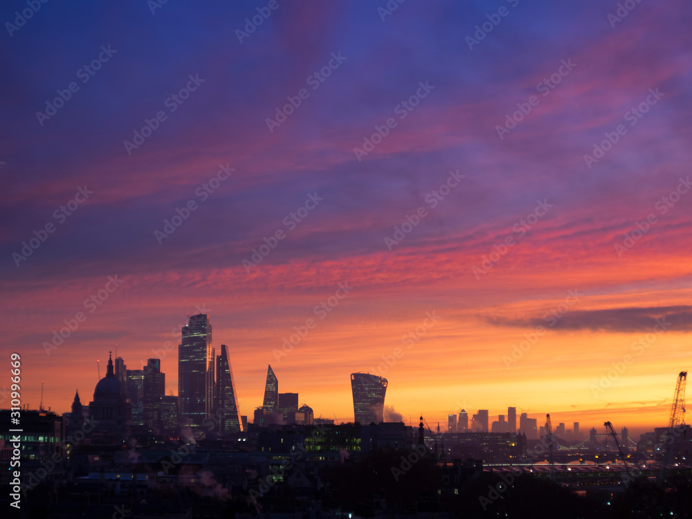 Epic dawn sunrise landscape cityscape over London city sykline looking East along River Thames