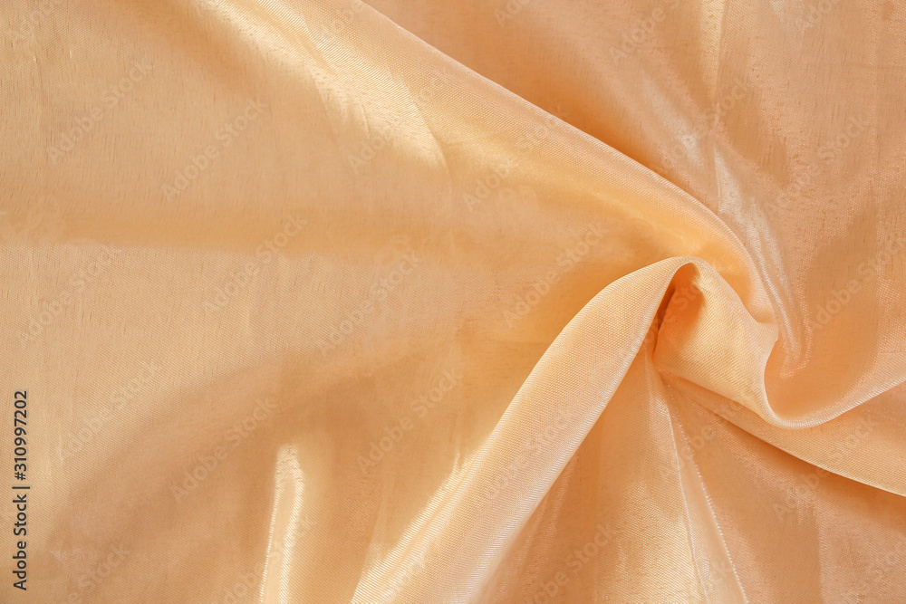 Light yellow silk fabric. Textile Background Texture. Expensive material. High resolution. Abstract waving fabric. Light yellow silk fabric. Textile Background Texture. Expensive material. High resolution. Abstract waving fabric.