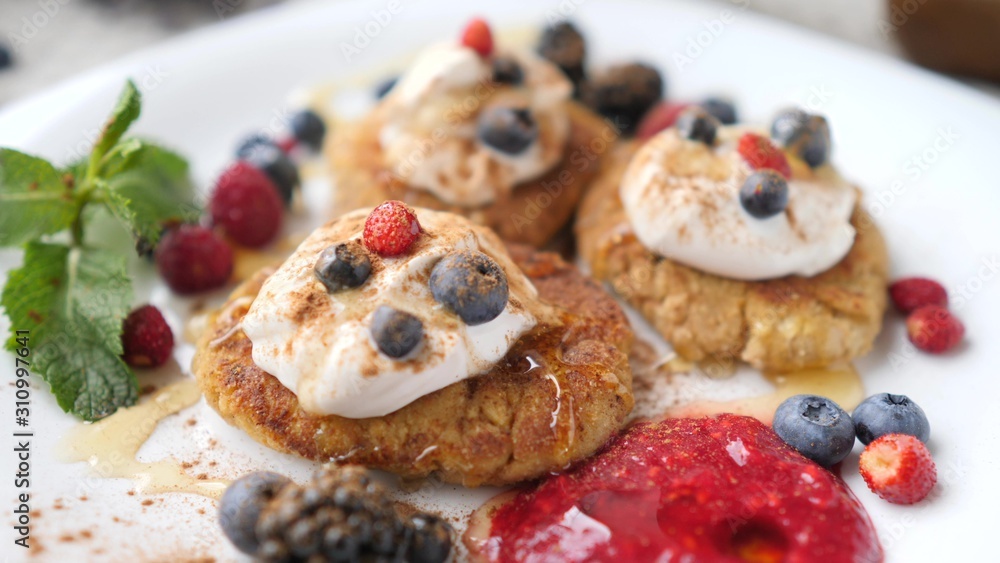 Closeup Of Healthy Vegan Breakfast. Sweet Pancakes With Berries.