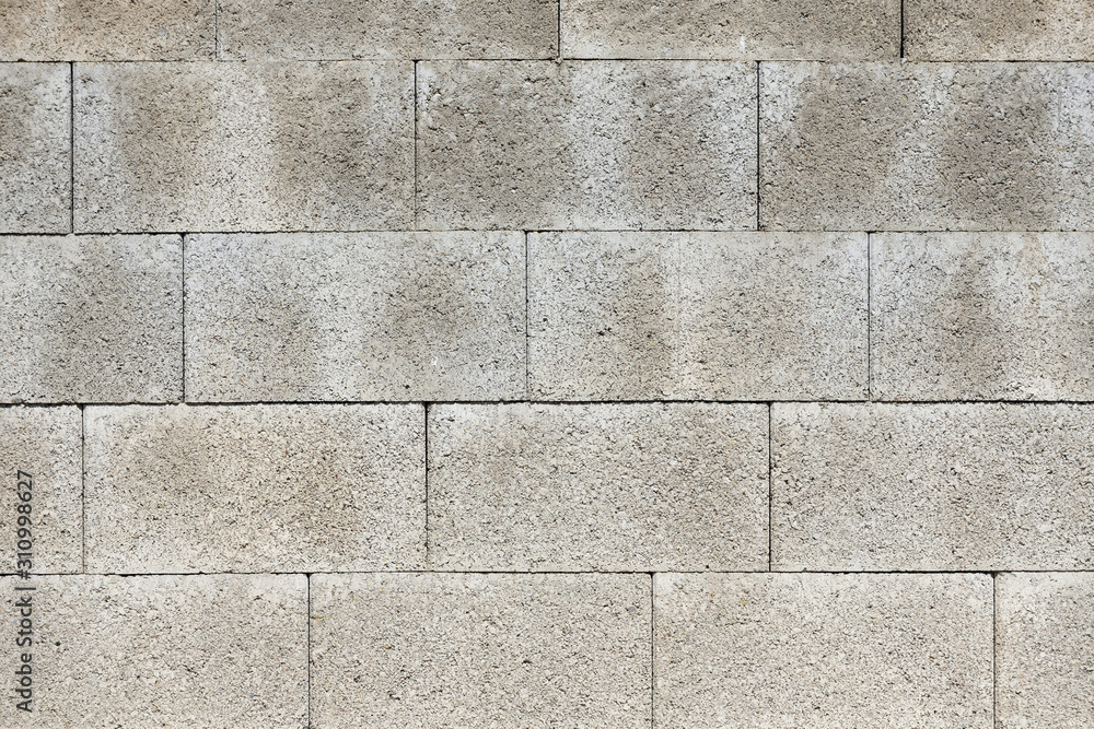 Obraz premium The texture of the wall of aerated concrete block. Aerated concrete brick wall fragment.