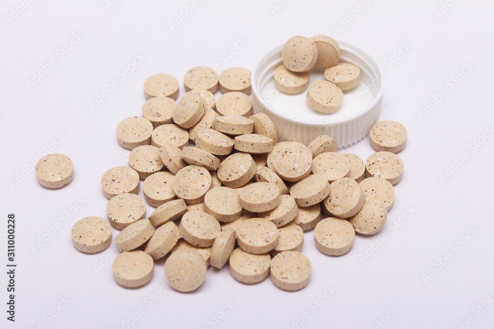 pile of pills isolated on white background pile of pills isolated on white background