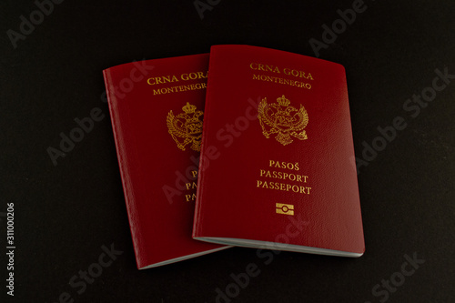 Montenegrin biometric passport isolate on black background