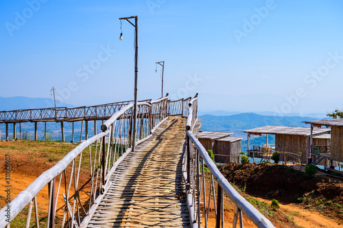 Vászonkép Wooden bridge with scenic view at Doi Sa Ngo viewpoint