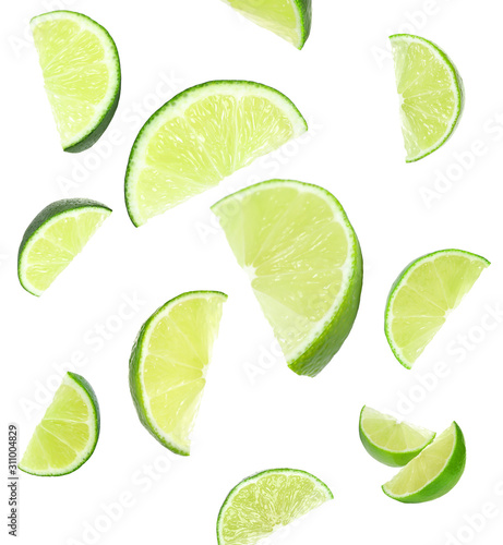 Collage of falling cut limes on white background