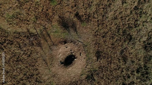 Aerial Drone view above ancient Wolves trap ground hole, fly over hill mountains of Fornelos de Montes in Galicia, Spain.   photo