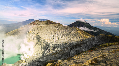 View from above  stunning view of the Ijen volcano with the turquoise-coloured acidic crater lake. The Ijen volcano complex is a group of composite volcanoes located in East Java  Indonesia.