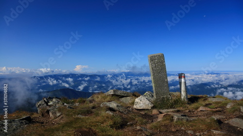 Old 1923 polish border stone on the top of a mountain