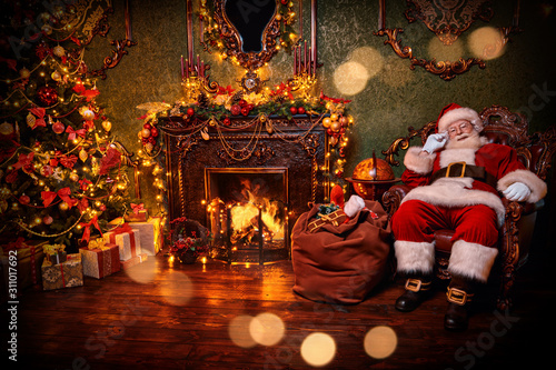 Santa in Christmas interior © Andrey Kiselev