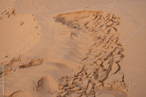 Close up of background texture of desert sand dunes. High resolution