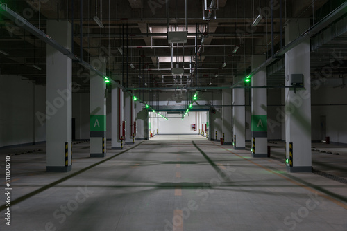 Space background of large indoor underground parking passage