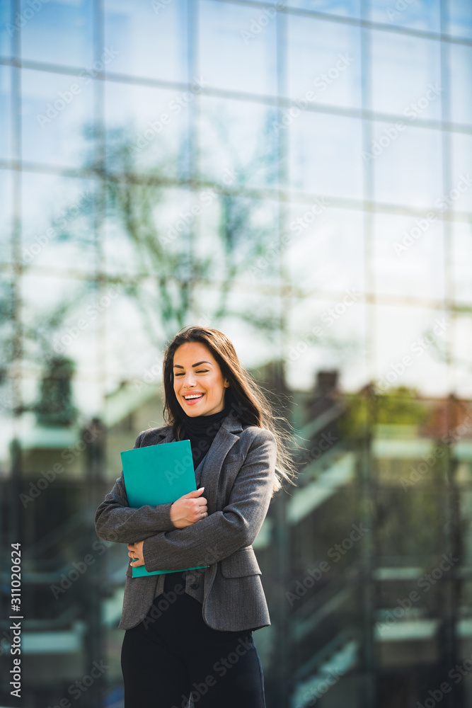 Portrait of beautiful business woman standing outside Portrait of beautiful business woman standing outside