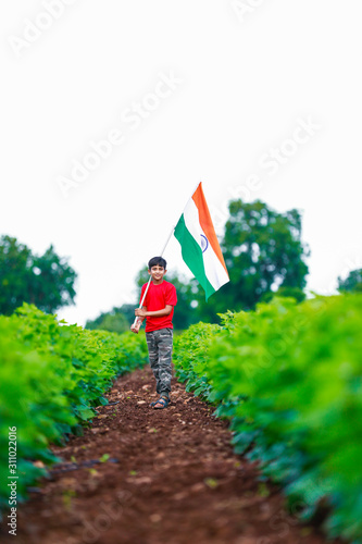 Cute little boy with Indian National Tricolor Flag	