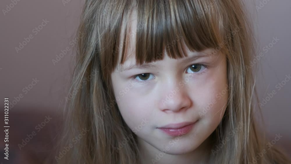 Portrait of funny child girl smiling in camera. Portrait of funny child girl smiling in camera.