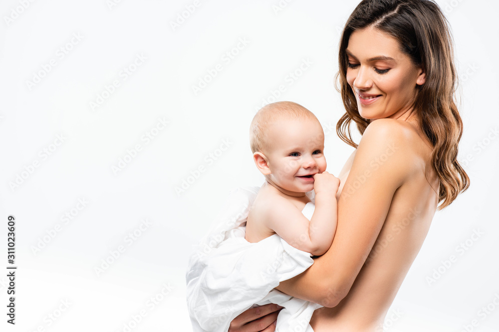portrait of cheerful naked mother holding baby, isolated on white portrait of cheerful naked mother holding baby, isolated on white