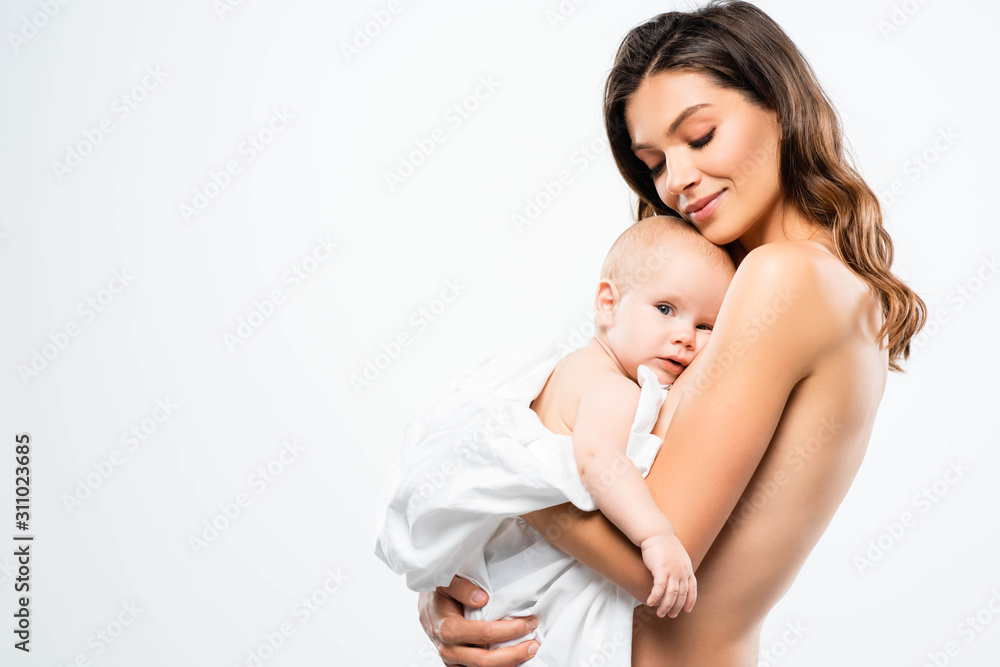 portrait of smiling naked mother hugging baby, isolated on white portrait of smiling naked mother hugging baby, isolated on white