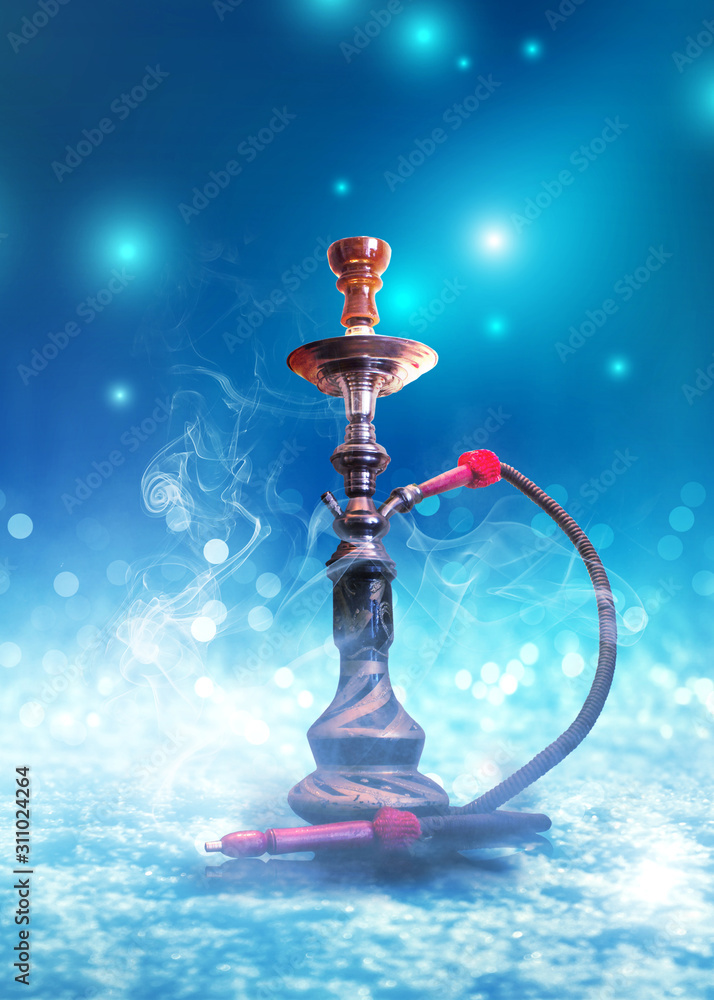 Hookah with smoke on a background of blurry lights. Abstract background, neon glow Hookah with smoke on a background of blurry lights. Abstract background, neon glow
