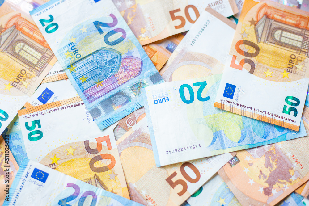 Background of 20 and 50 value Euro money bill close up Background of 20 and 50 value Euro money bill close up