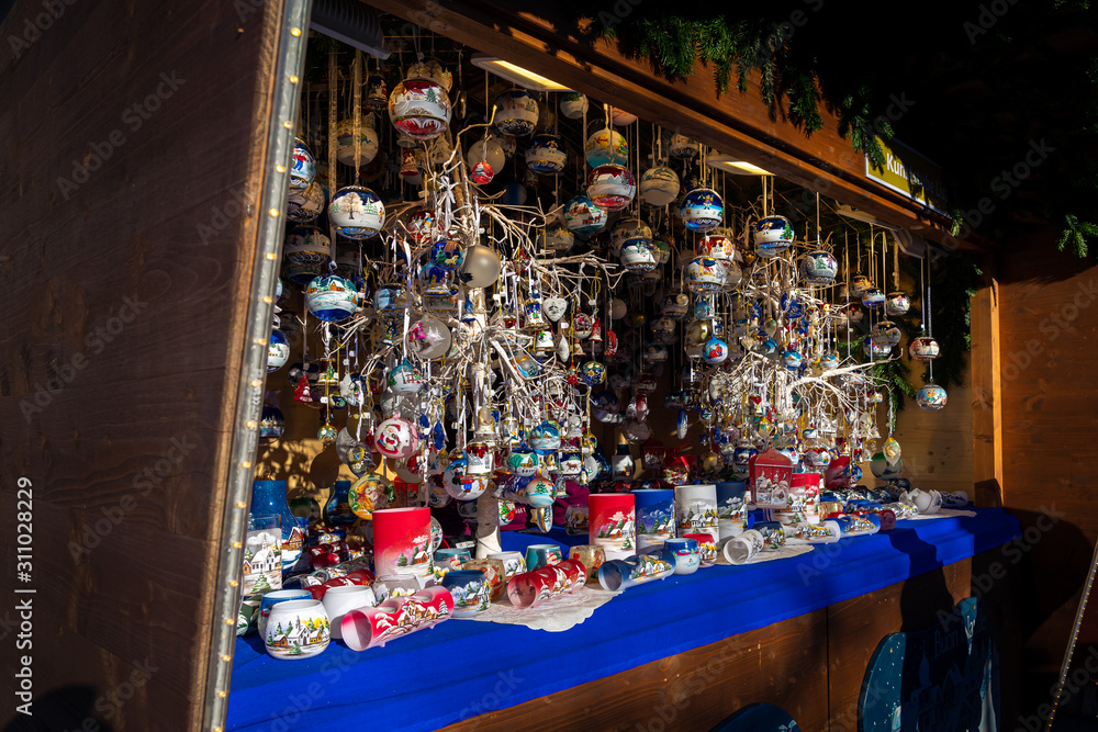 Merano, South Tyrol, Italy. Detail of Christmas decorations for sale in a kiosk of the Christmas market