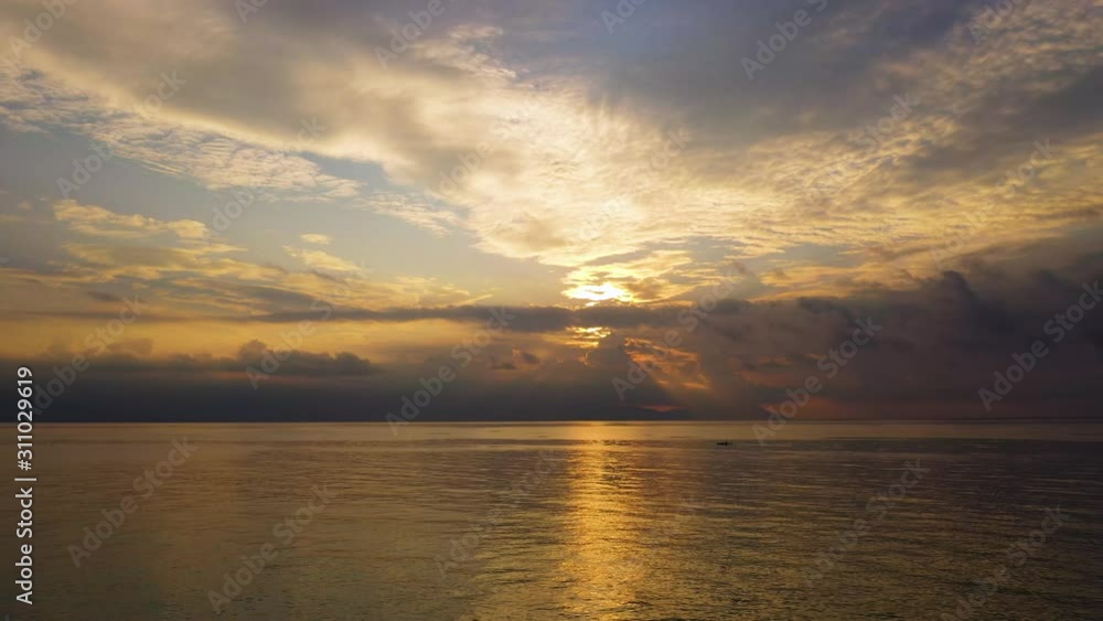 Panoramic dramatic sunrise, sky and tropical sea. Sea and sky with clouds. Sogod Bay, Philippines. Summer and travel vacation concept. Panoramic dramatic sunrise, sky and tropical sea. Sea and sky with clouds. Sogod Bay, Philippines. Summer and travel vacation concept.