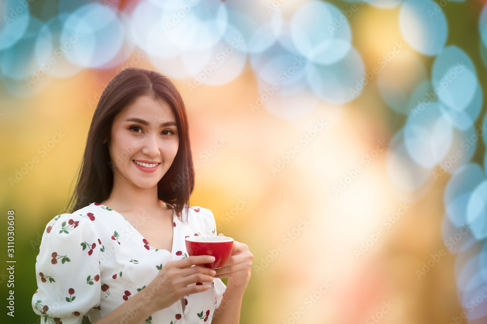 beautiful woman and red coffee on hand bokeh background abstract beautiful woman and red coffee on hand bokeh background abstract
