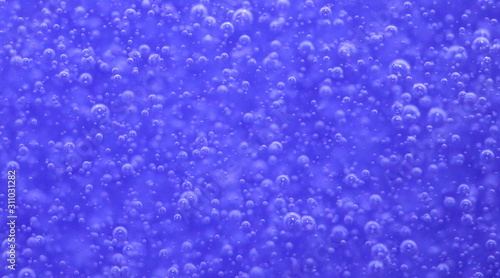 Bubbles in a blue bottle