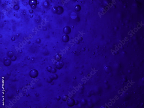 Bubbles in a blue bottle