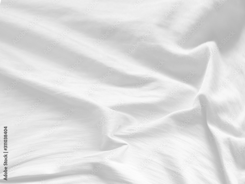 Crumpled white fabric background. White cloth background abstract.
