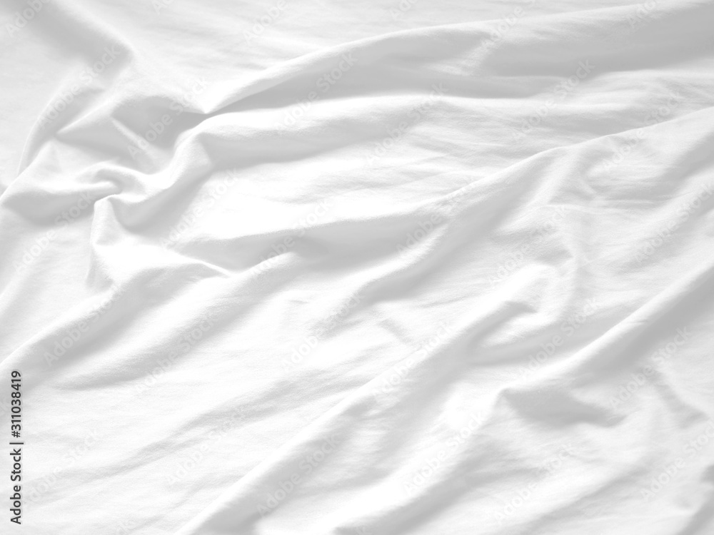 Crumpled white fabric background. White cloth background abstract. Crumpled white fabric background. White cloth background abstract.