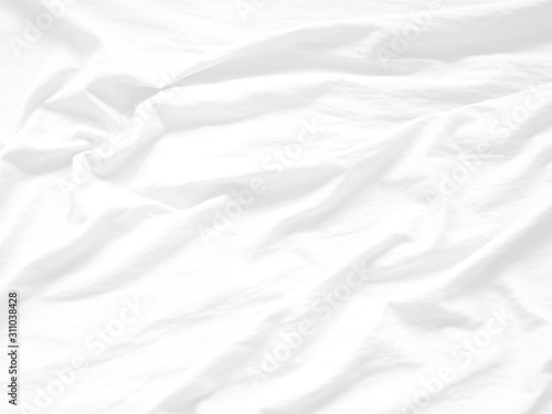 Crumpled white fabric background. White cloth background abstract.