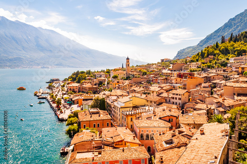 Valokuvatapetti Limone Sul Garda cityscape on the shore of Garda lake surrounded by scenic Northern Italian nature