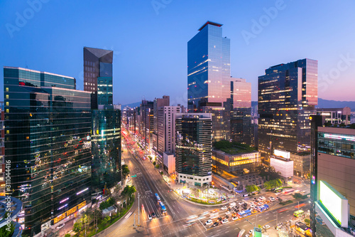 Photography Seoul city Skyling and Skyscraper and Traffic at niaht intersection in Gangnam, South Korea