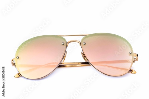 Close-Up Of Sunglasses Against White Background