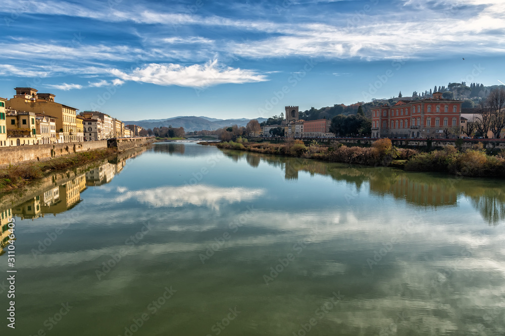 View of the Arno River on a winter sunny day in Florence