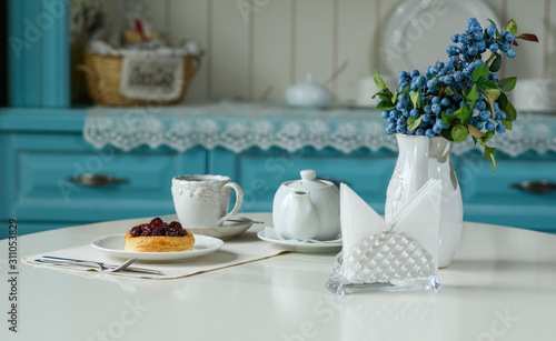 Wallpaper Mural Danish with cherries and black tea on a table in a cozy coffee shop Torontodigital.ca