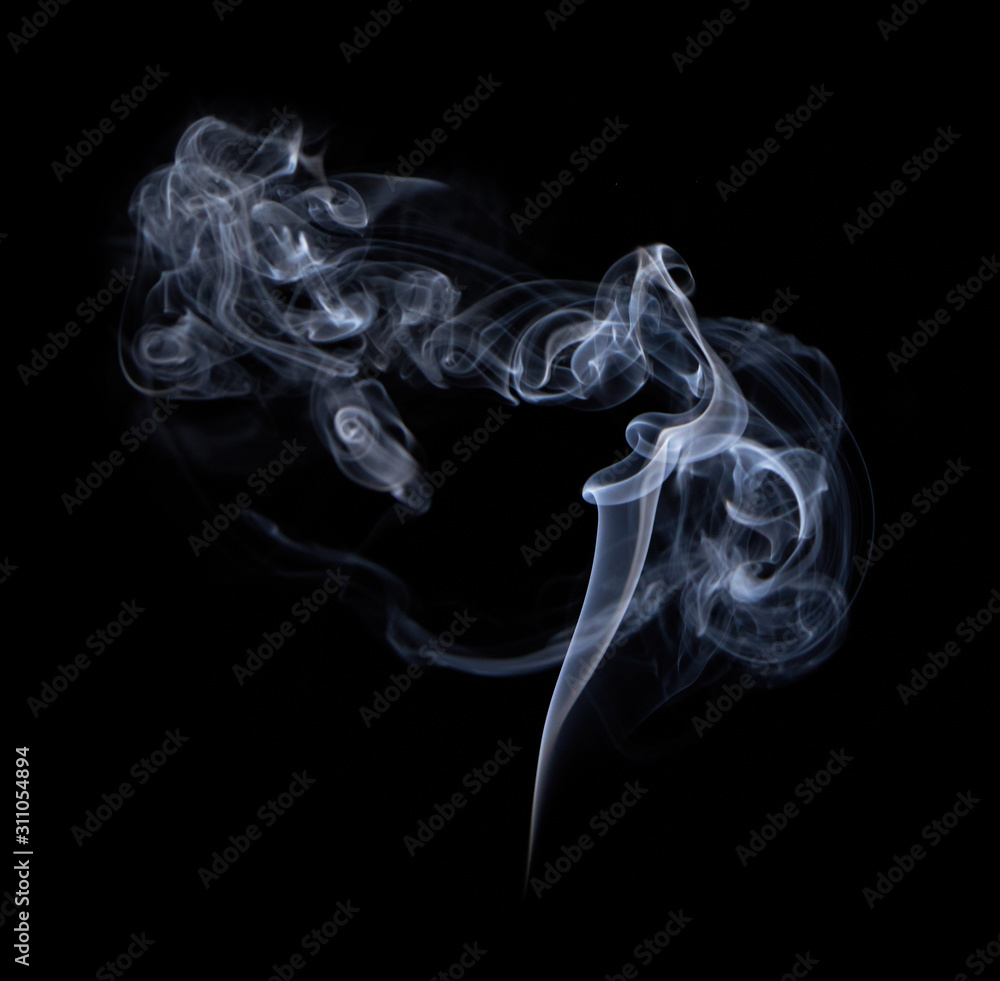 Fototapeta premium Photo of real white smoke on black background