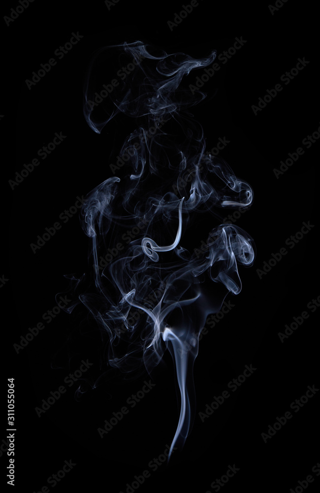 Photo of real white smoke on black background Photo of real white smoke on black background