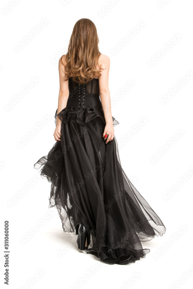 Woman back Rear view in Black Dress, Beautiful Fashion Model walking away in Long Gown on White Background Woman back Rear view in Black Dress, Beautiful Fashion Model walking away in Long Gown on White Background