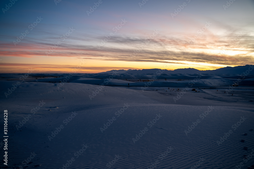 Sun begins to fall over the dunes of White Sands New Mexico. 