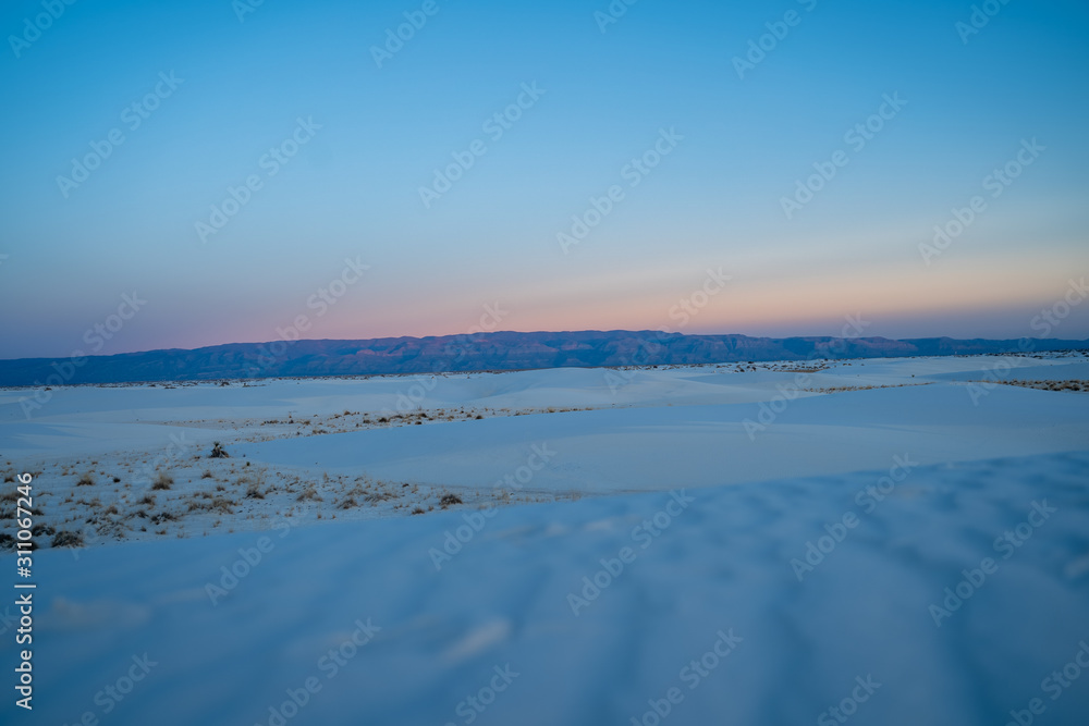 Views from the beutiful dunes of White Sands New Mexico as the sun sets over the desert. 
